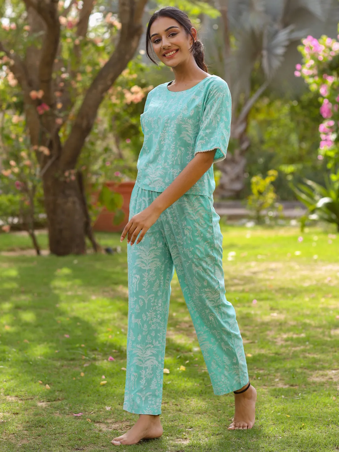 Jaipur Kurti Women Light Blue Rayon Slub Quirky Printed Night Suit.