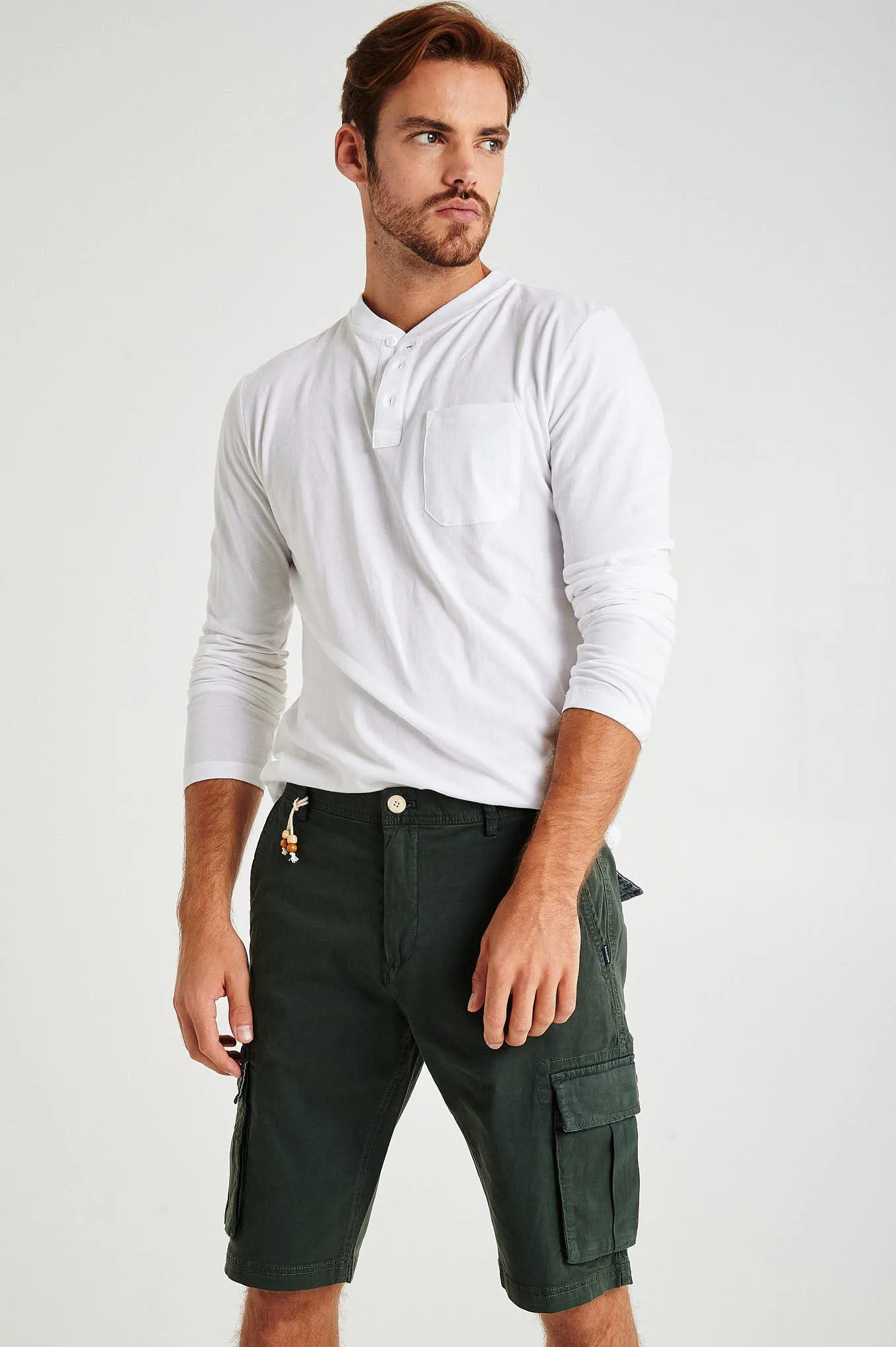 Plain pastel coloured with organic cotton cargo bermuda shorts