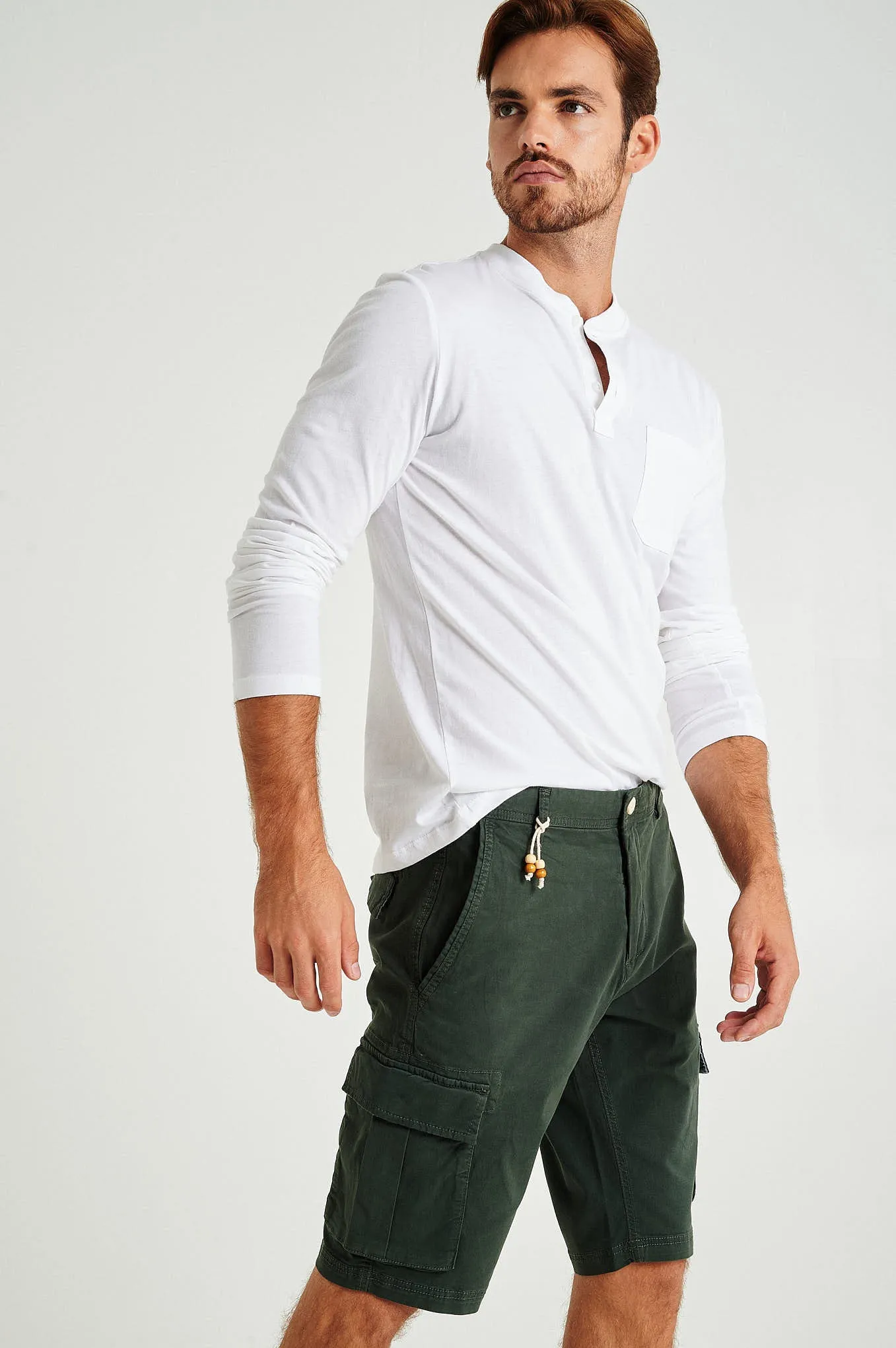 Plain pastel coloured with organic cotton cargo bermuda shorts